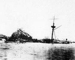 The battered remains of the USS Maine following a mysterious explosion.